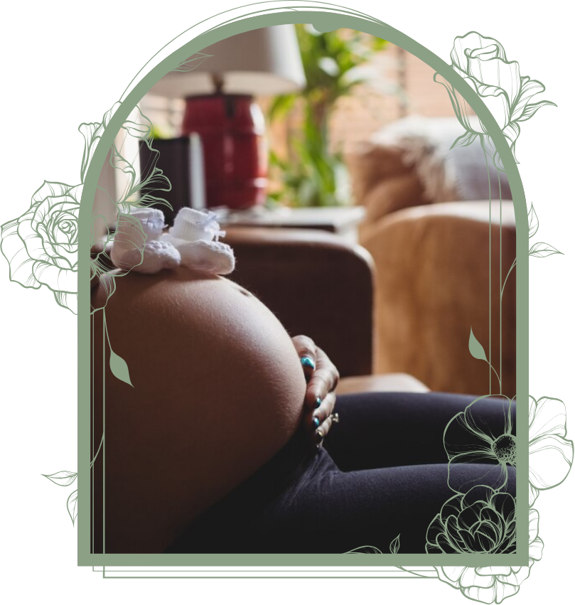 pregnant woman placed her two hands to her tummy